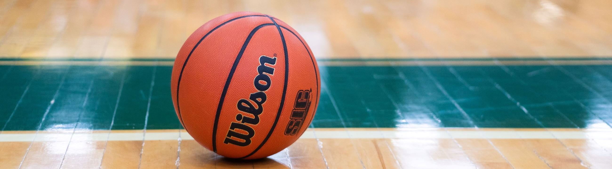 Wilson Basketball on Wooden Court